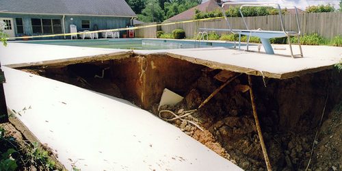 Erosion caused by pool leak. Get a pool Inspection