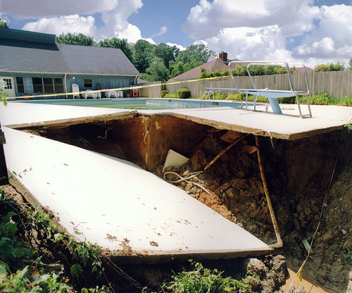 Erosion caused by pool leak. Get a pool Inspection